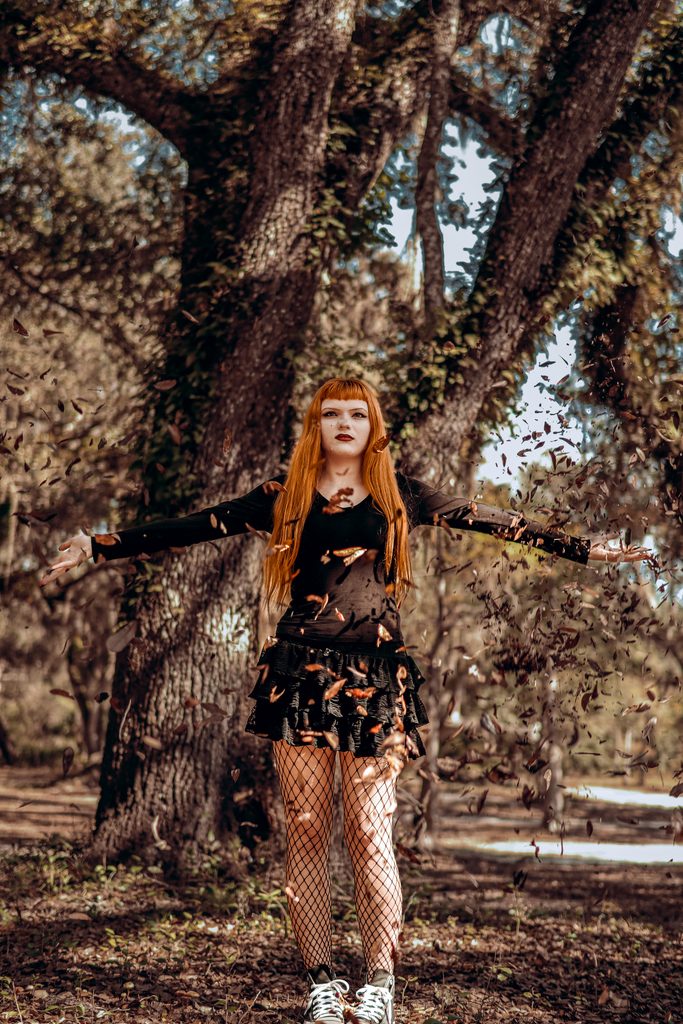 Air witch element with the Earth's leaves floating around deep in a forest in Ocala Florida